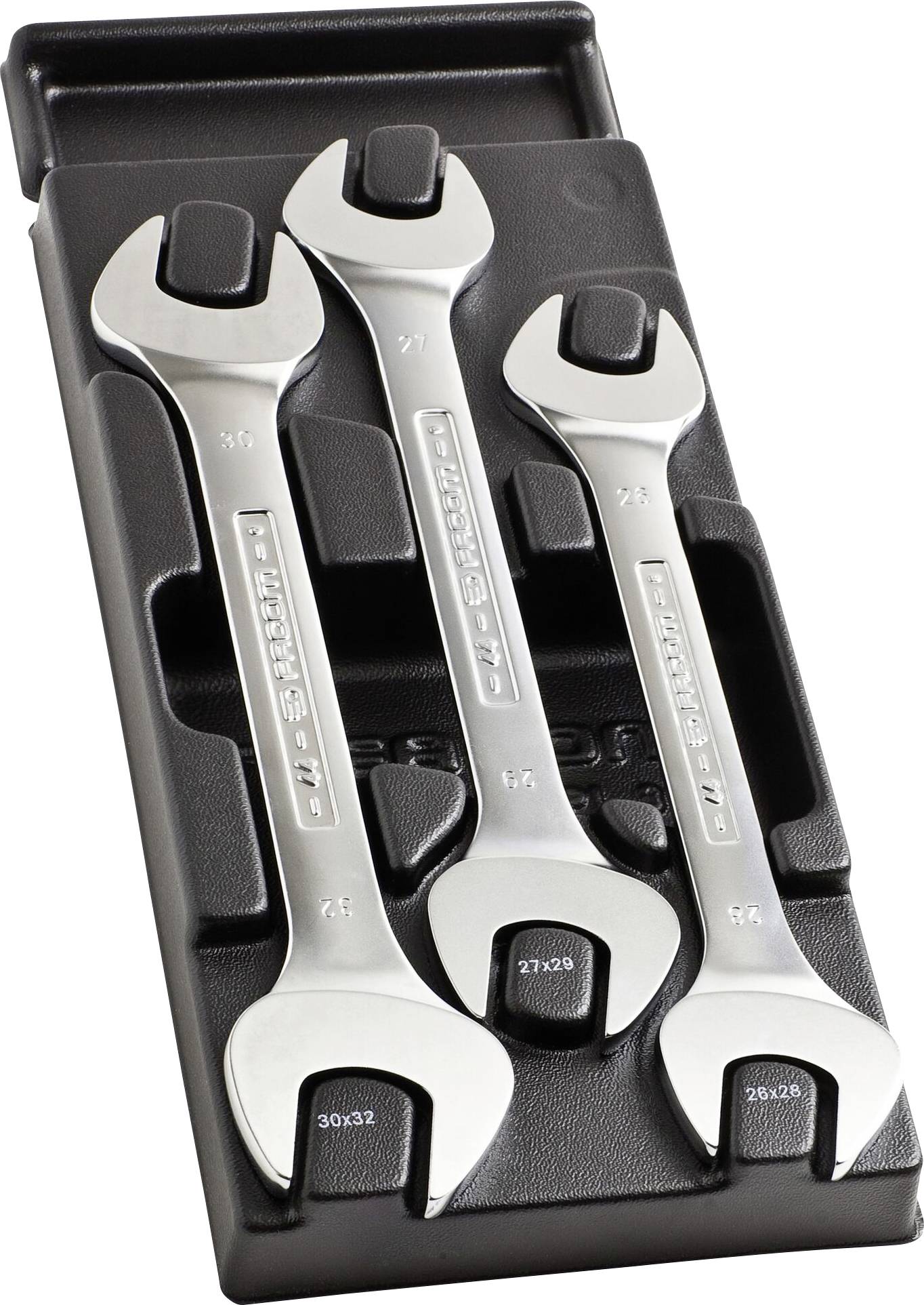 Three silver spanners of varying sizes are resting in a black holder.