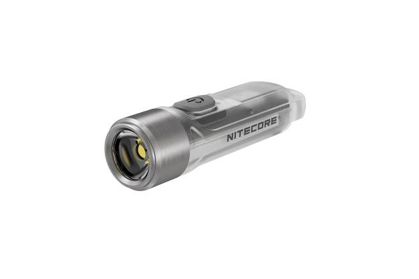A small, silver torch with the 'Nitecore' logo on the side.