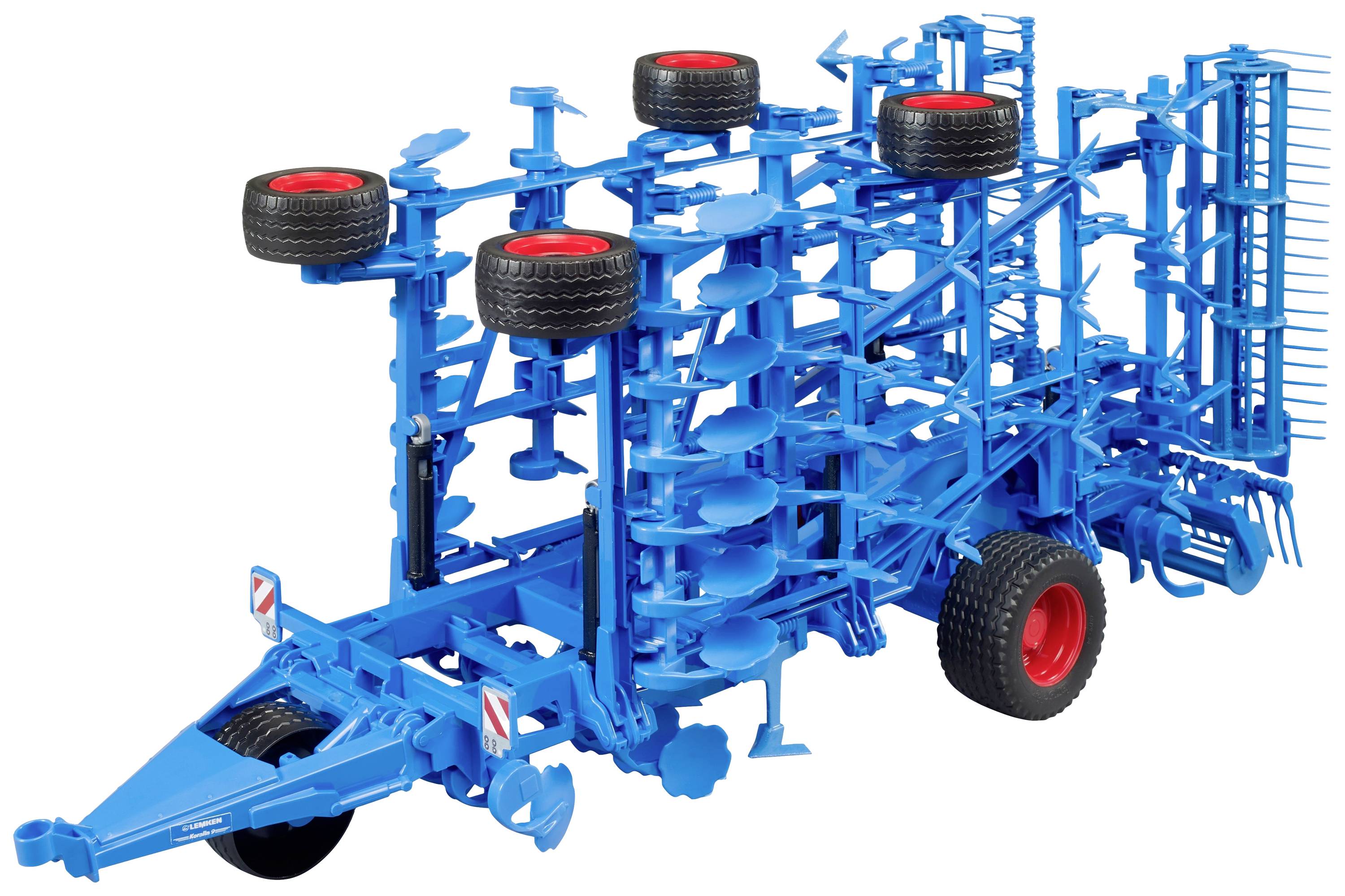 Large blue agricultural cultivator with multiple discs and wheels, parked on a farmyard.