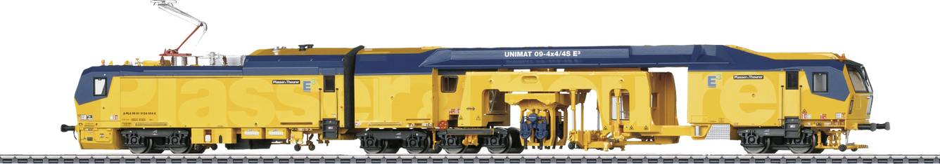 Yellow rail grinding train on track, side view. An overhead line is partially visible. Train has the 'Speno International' logo.