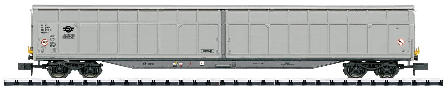 Grey goods wagon on railway tracks, side view, with labels and symbols.