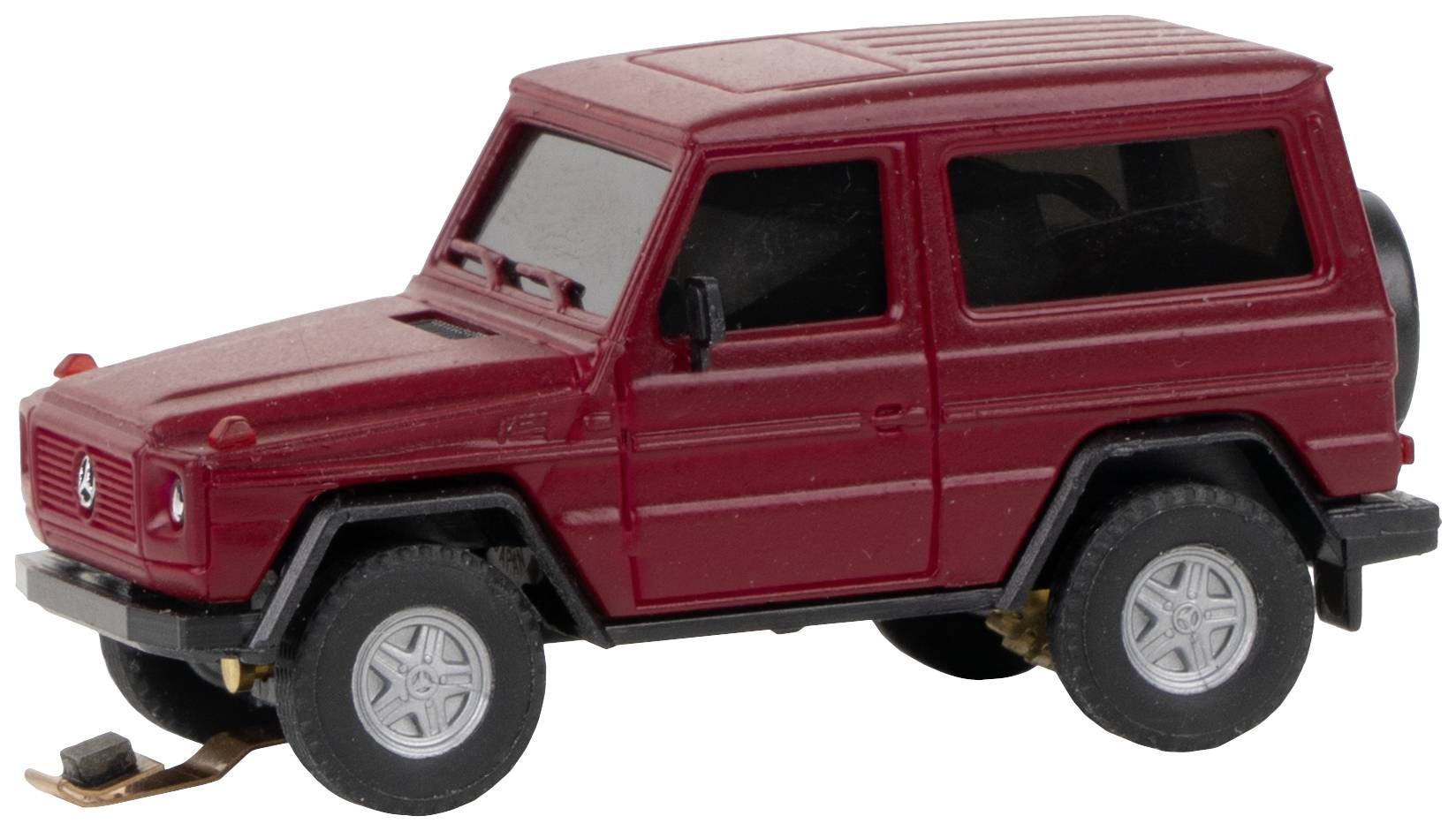 Red model off-road vehicle on a white background. The vehicle has realistic details and is scaled down.