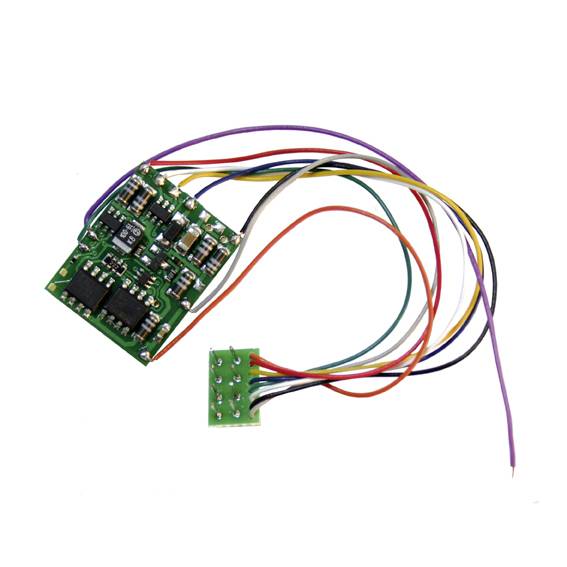 A green circuit board with multiple electronic components and colourful wires, used for controlling electronic devices.
