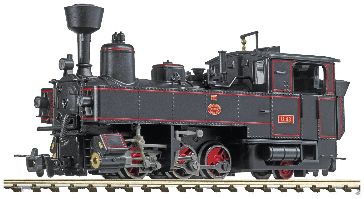 A model of a black steam locomotive with red accents sits on railway tracks. The locomotive displays detailed components and markings.