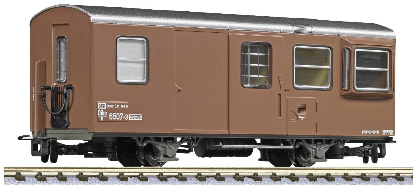A brown goods wagon on a model railway track, with windows on the side.