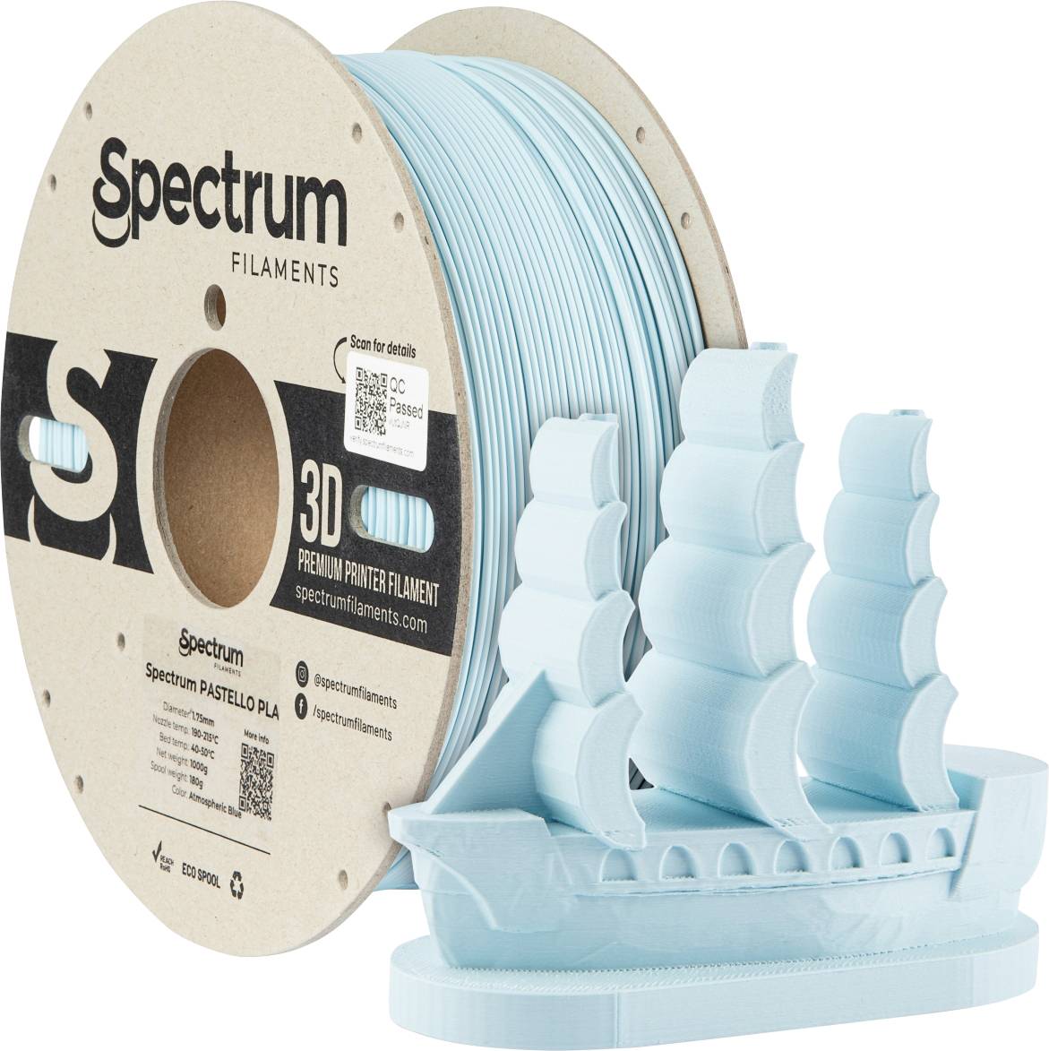 A reel of light blue 3D printer filament sits to the left of a light blue 3D-printed model of a sailing ship.