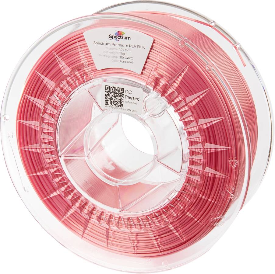 A reel of rose gold PLA-silk filament for 3D printers. The label displays the brand, material, and a QR code.