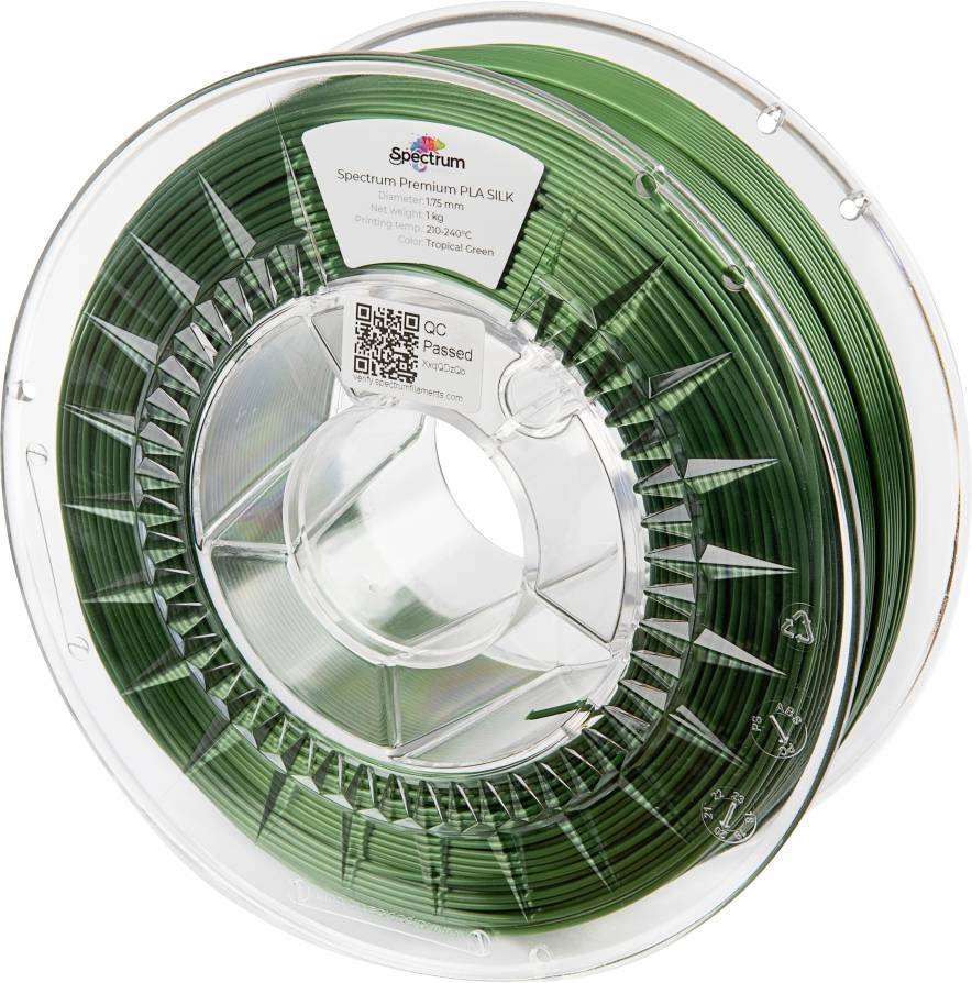 Green plastic roll for 3D printers, labelled as 'Spectrum Premium PLA SILK', wound on a spool.