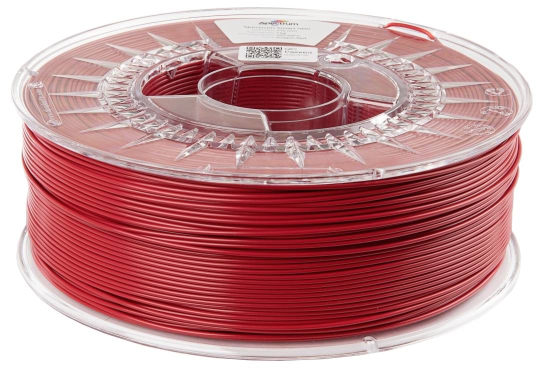 A reel of red 3D printer filament, neatly wound.