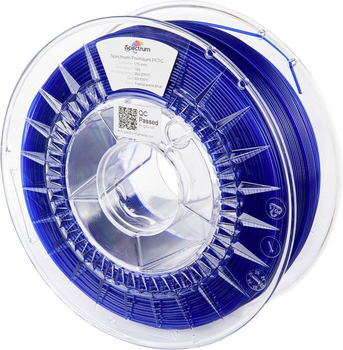 A spool of blue filament for 3D printers. Product details and a QR code are visible on the label.