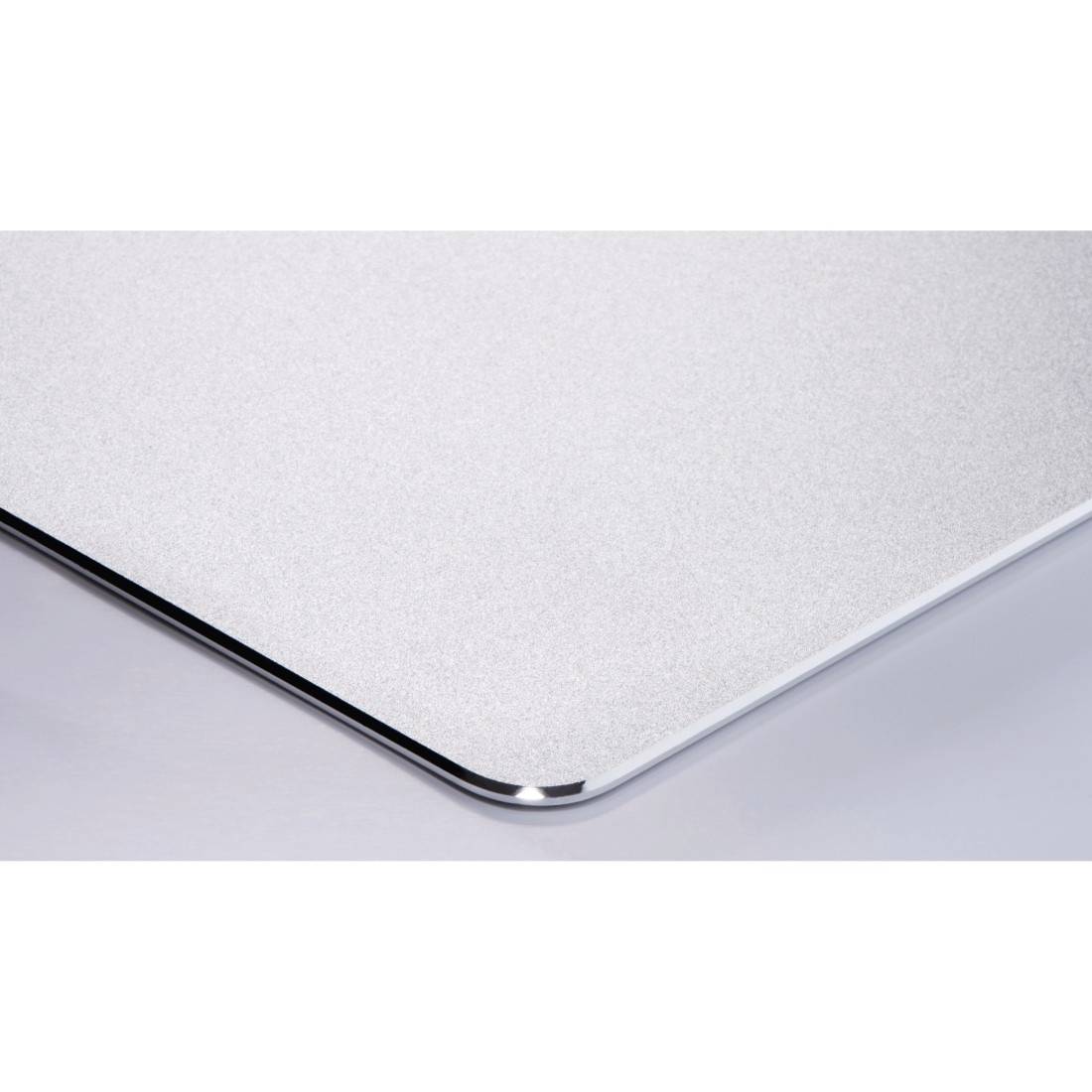 Corner of a silver metal plate with a bevelled edge on a grey background.