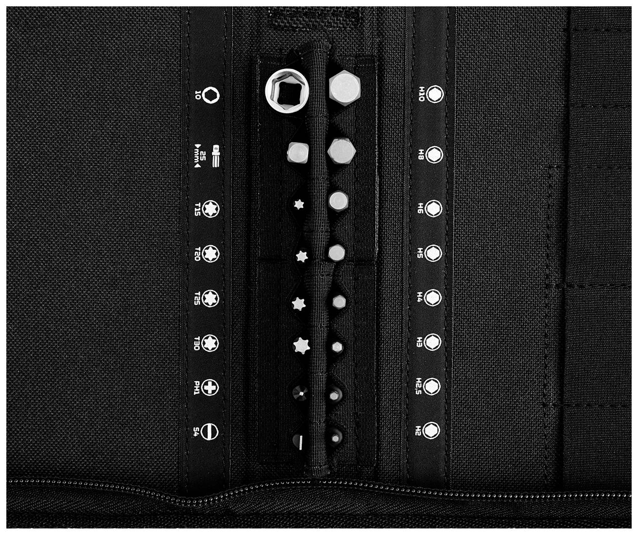 Various spanners and bits are neatly arranged in a black tool bag.