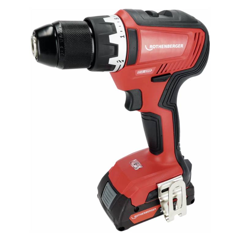 A red cordless drill driver with a black handle and drill head, brand ROTHEBERGER, for DIY work.