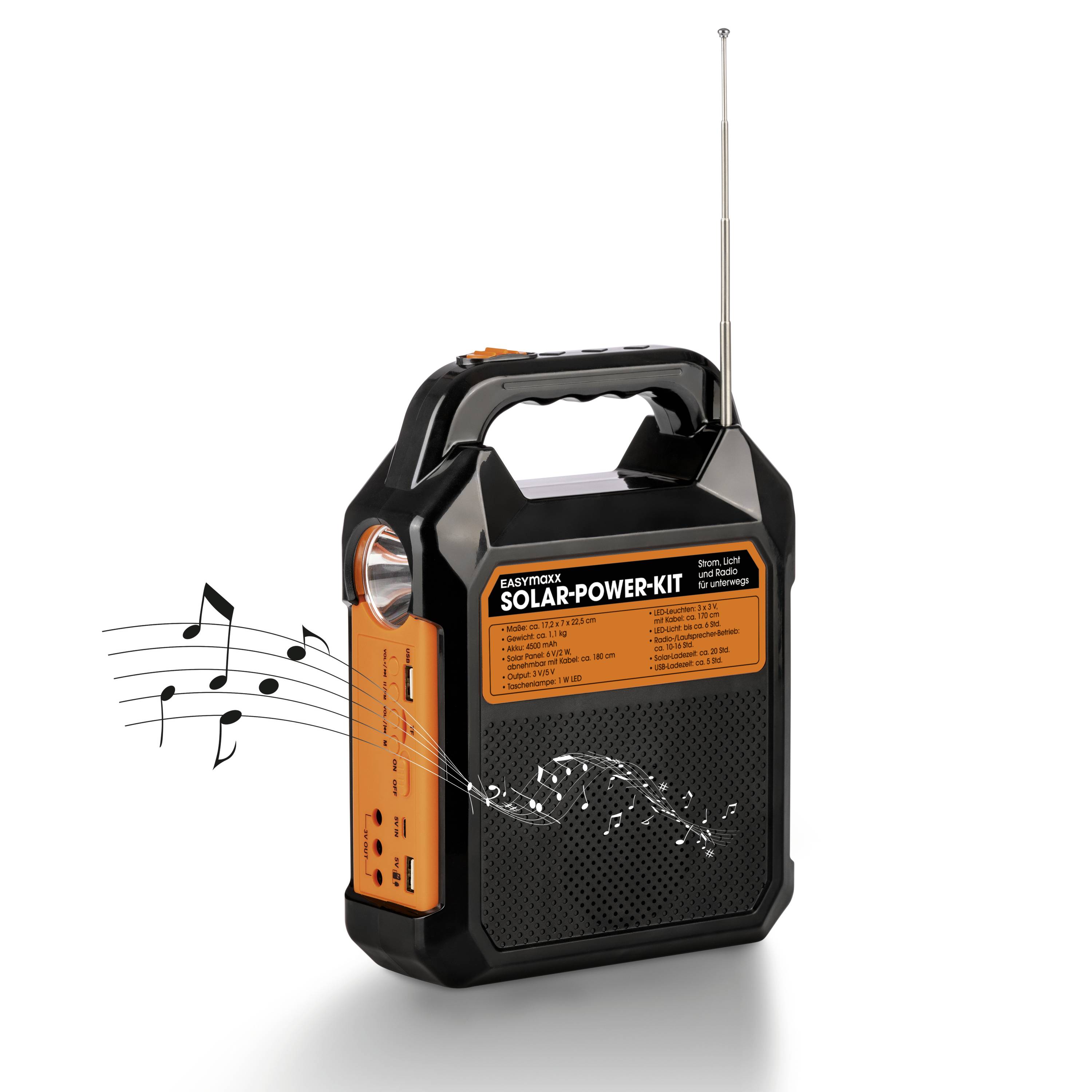 Portable solar power kit with built-in radio, black casing with orange accents, extendable antenna and musical notes.