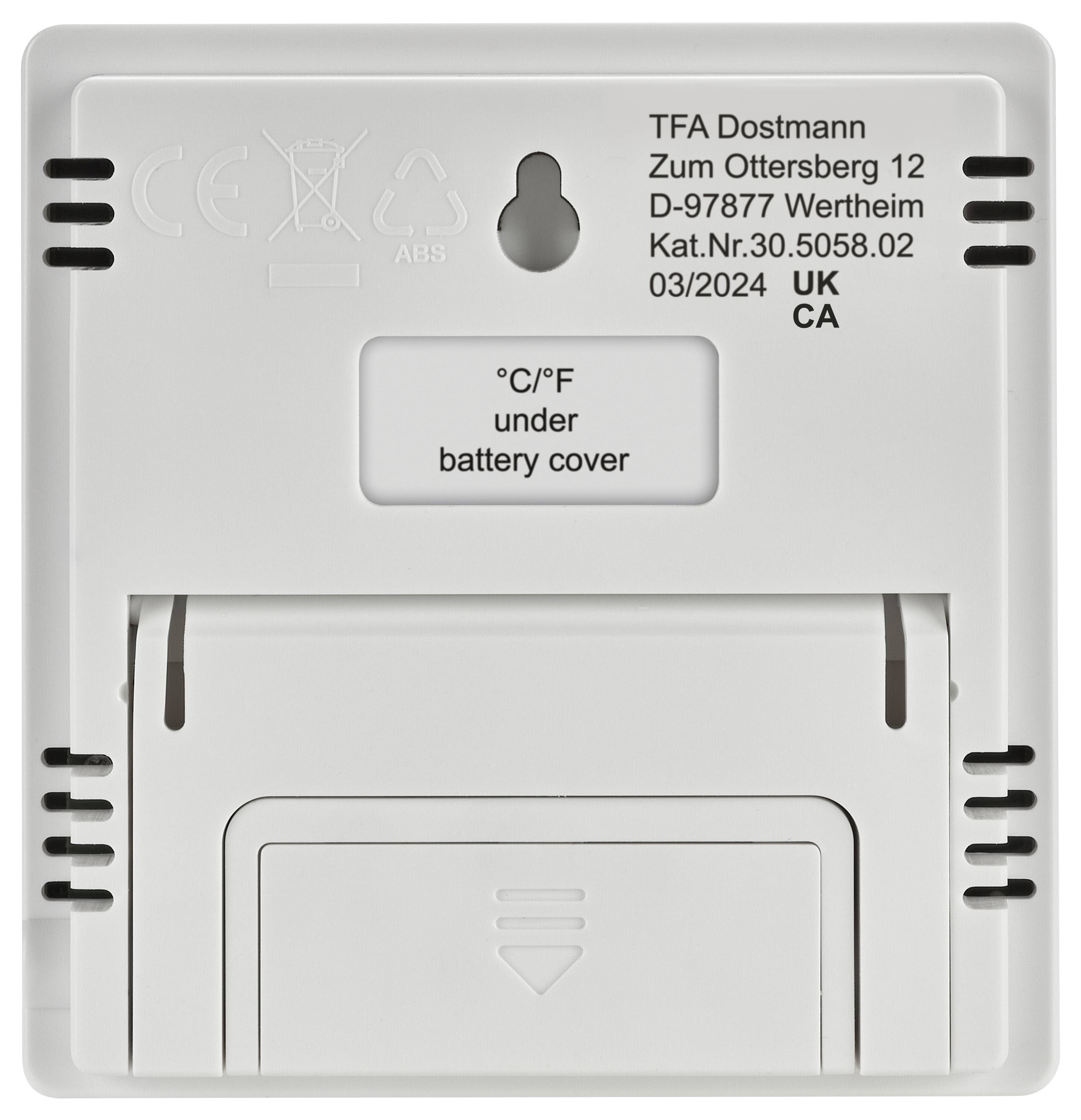 Back of an electronic device with TFA Dostmann company information, CE marking, and indication for the battery cover.