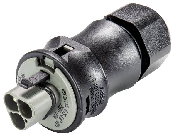 An electrical connector in close-up; showing a black plastic housing with multiple connections for industrial applications.