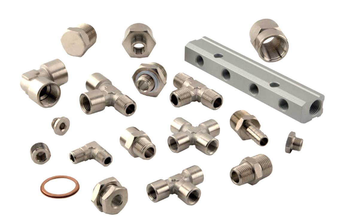Various metal pipe fittings and connections, including T-joints, elbows, and caps, arranged on a white background.