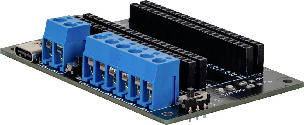 An electronic circuit board with blue terminal blocks and black connectors, potentially for Arduino expansions.