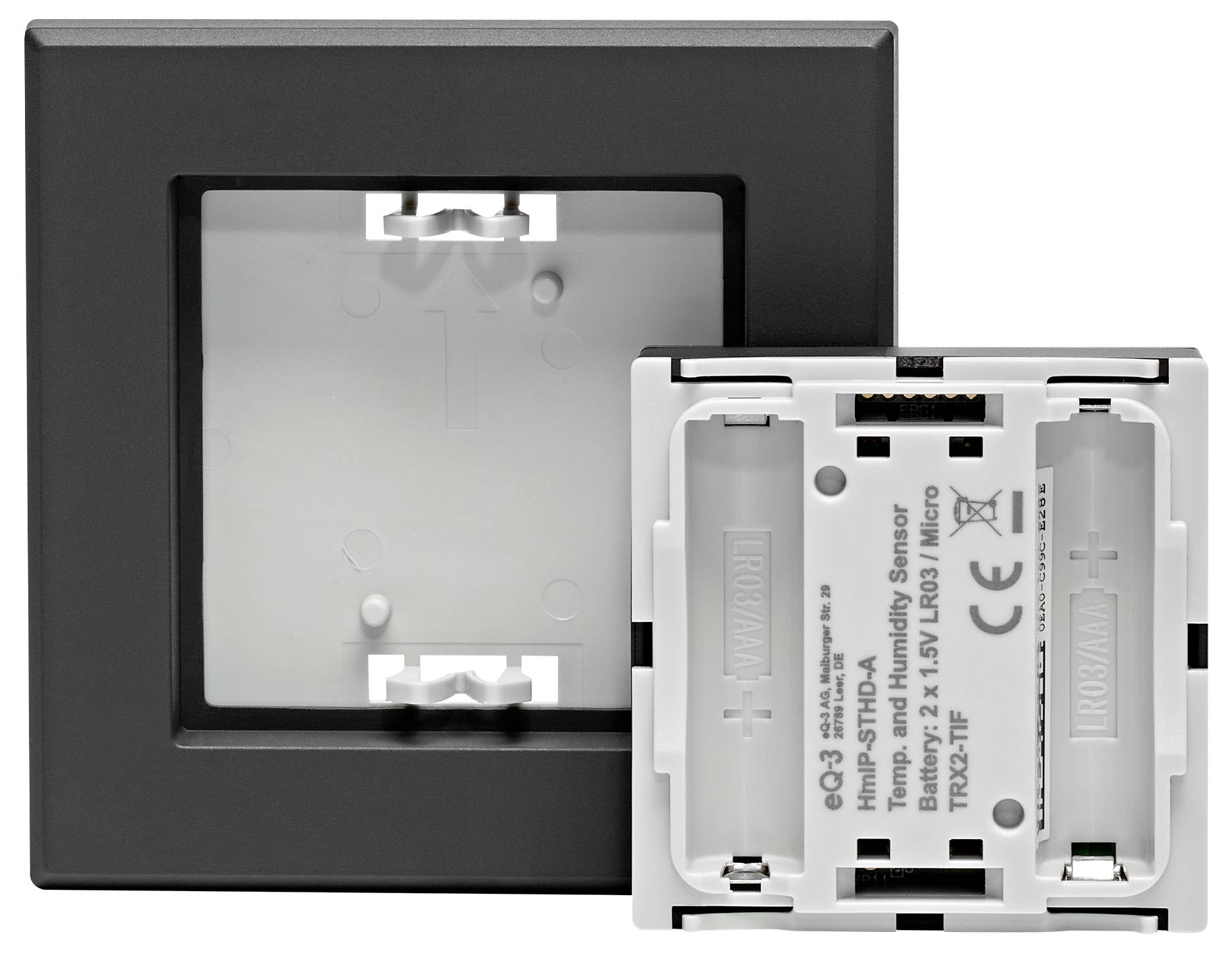 Back and front view of a moisture sensor for wall mounting, with battery compartment and connection points visible.