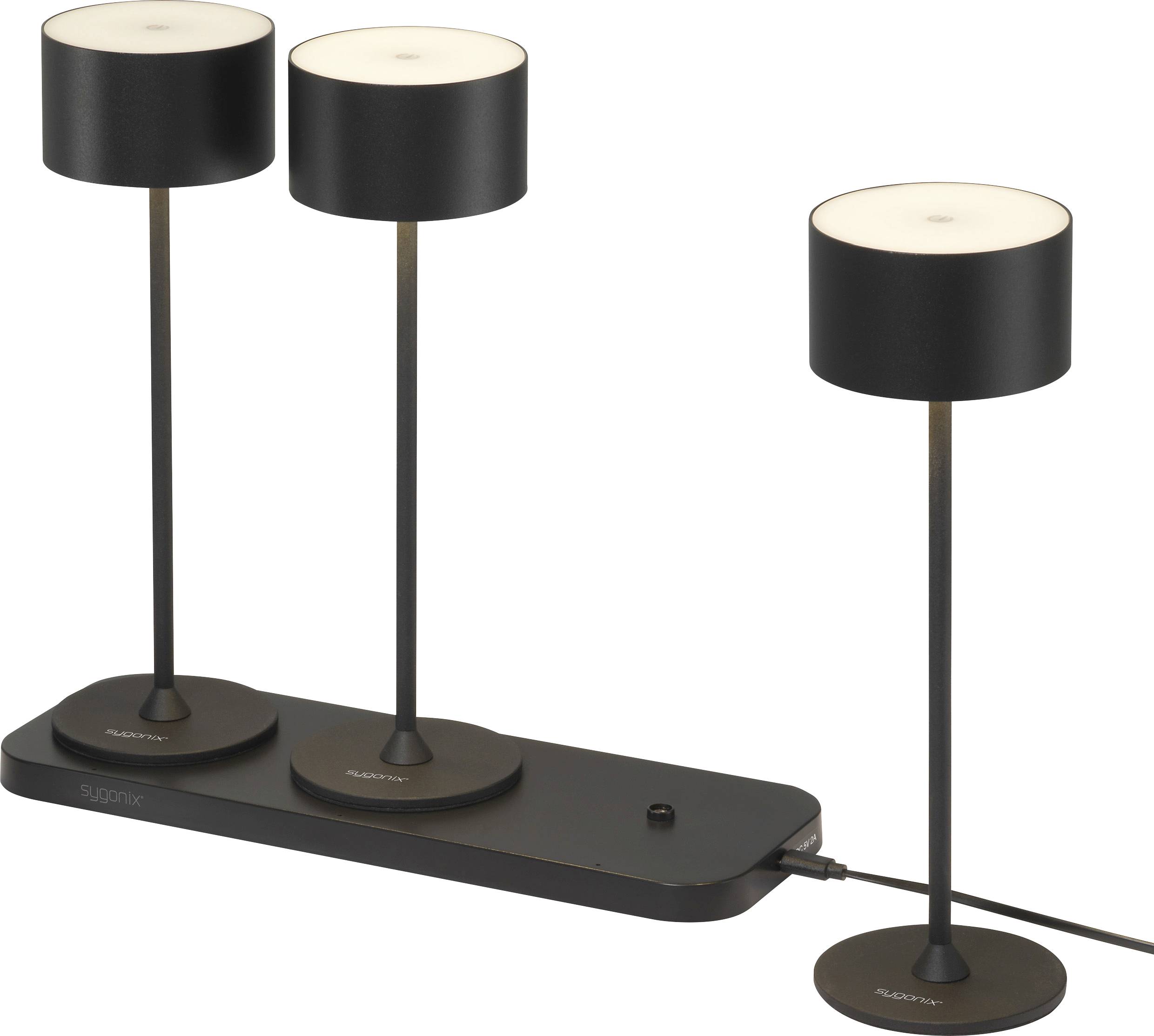 Three black LED lamps on a rectangular base, connected by a cable, emphasising minimalist design and functionality.