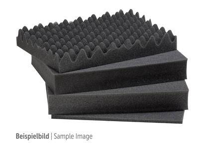 Four black acoustic foam panels with pyramid and wave patterns stacked on top of each other.