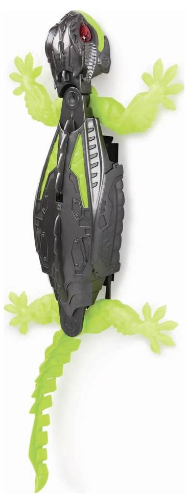 An electronic toy in the shape of a robotic lizard with a green body and grey armour, climbing a wall.