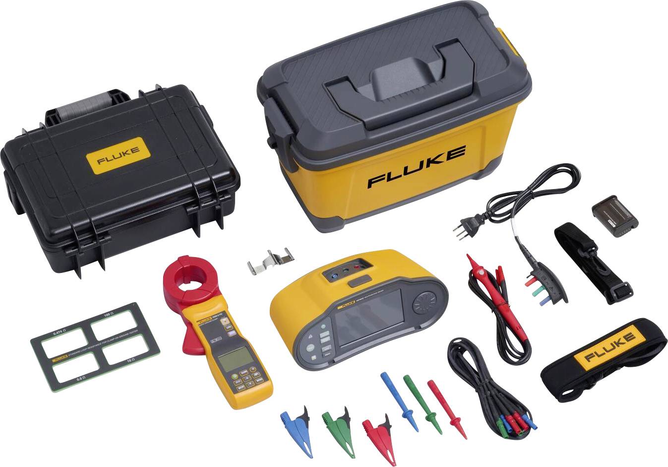A Fluke measuring set with a hard-shell case, portable measuring device, measuring accessories and cables, all arranged on a white surface.