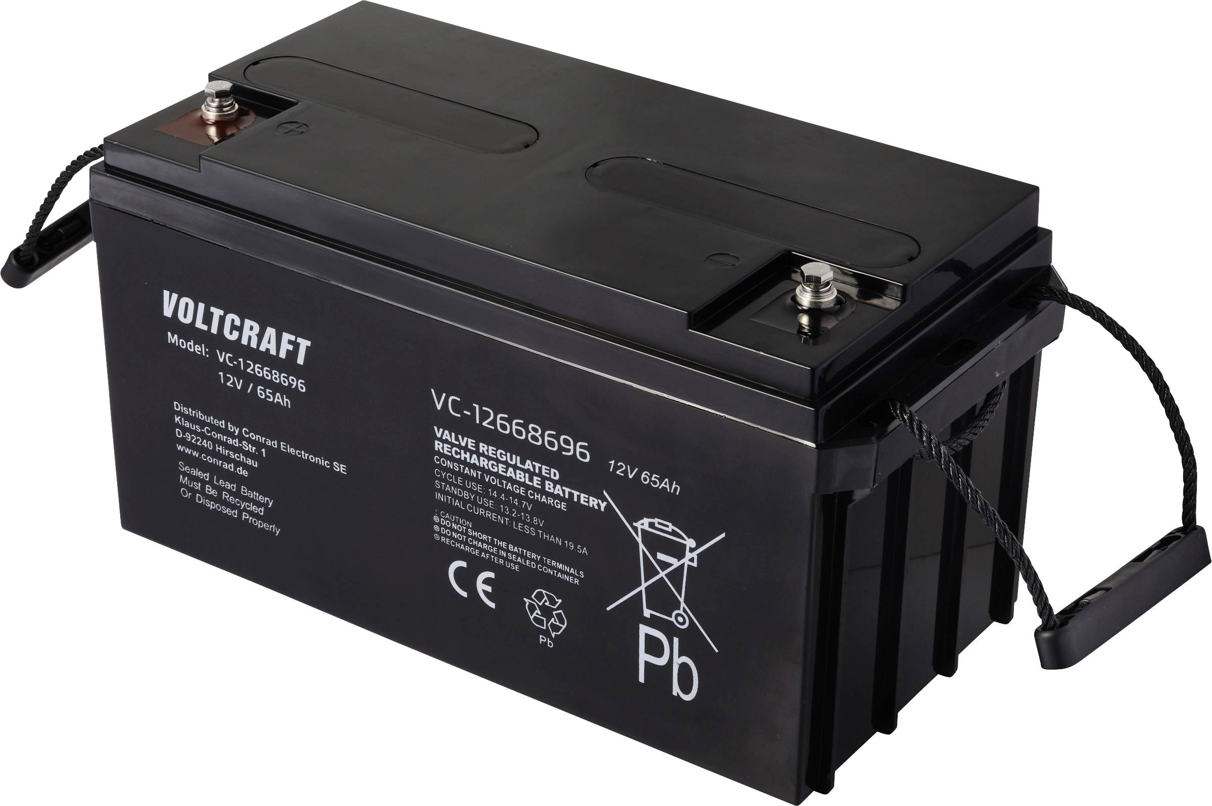 Black car battery from Voltcraft brand with imprint 'VC-126585G', 12V 65Ah. Terminal connections on top, red and black poles.