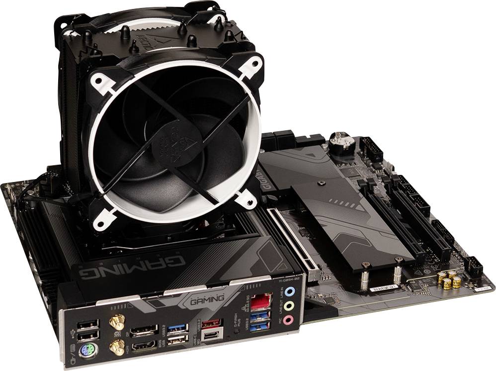 A computer motherboard with an installed CPU cooler. Visible connections include USB ports, audio sockets, and LAN port.