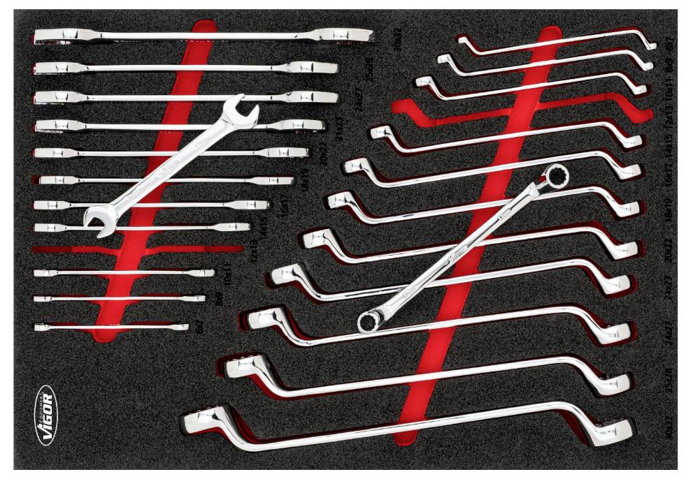 A complete set of chrome-plated spanners in various sizes and shapes, neatly arranged in a foam insert.
