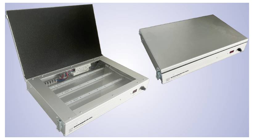 A metal laptop case is pictured, both open and closed, with the open case revealing internal slots and wiring.