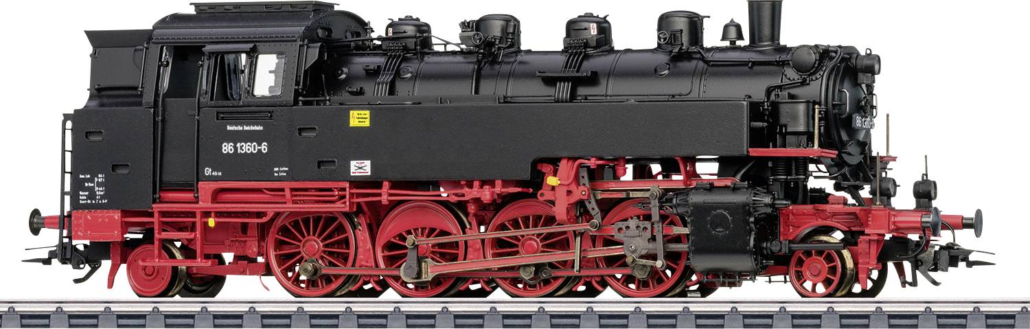 'Steam locomotive model from the side, painted black and red, standing on a track. Detailed representation of wheels, boiler and driver's cab.'