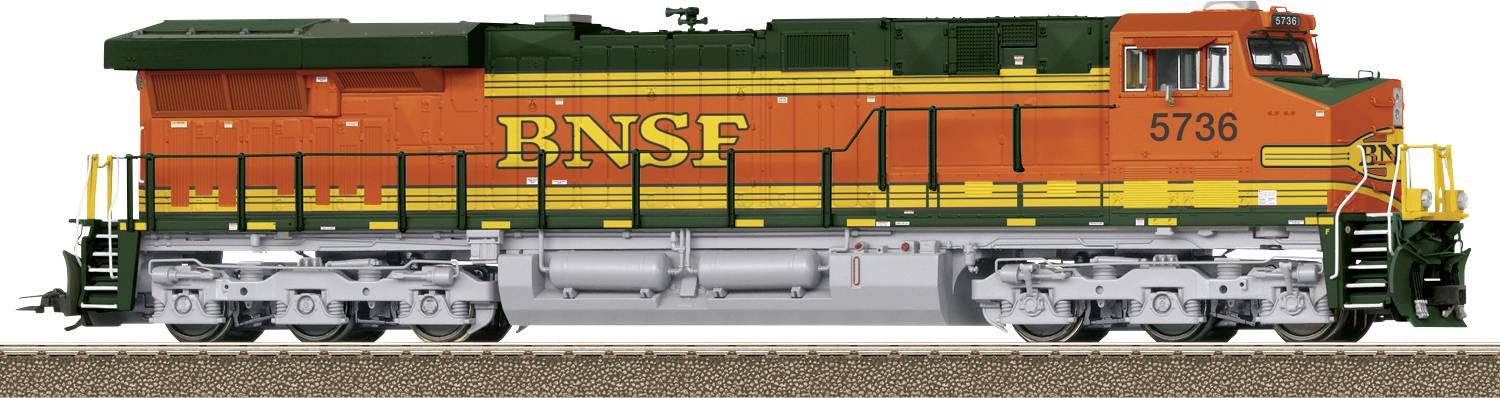 An orange and green freight train with 'BNSF' markings is stationary on a track. The locomotive bears the number 5736.