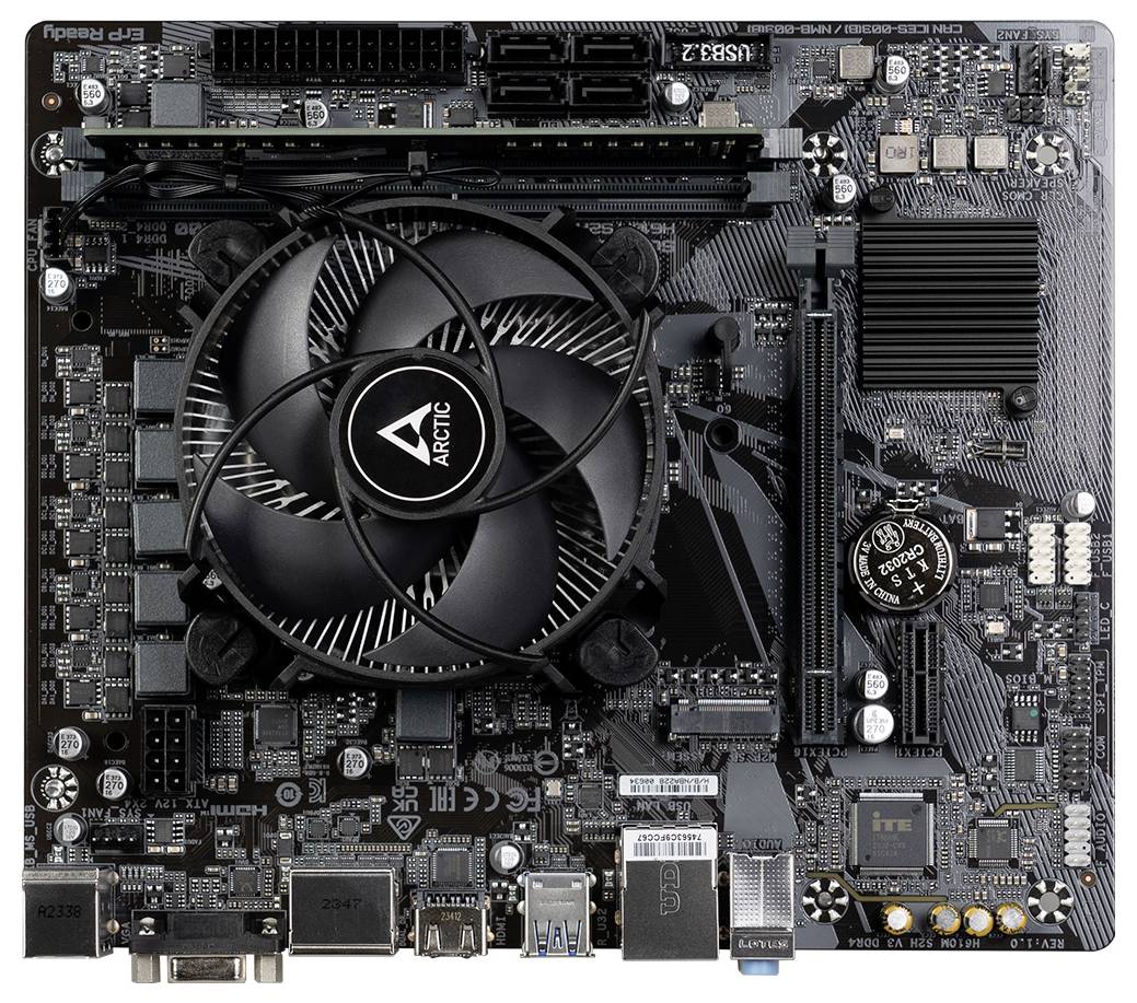 Computer motherboard with heatsink and various ports, fan centrally positioned. Multiple expansion slots for components visible.