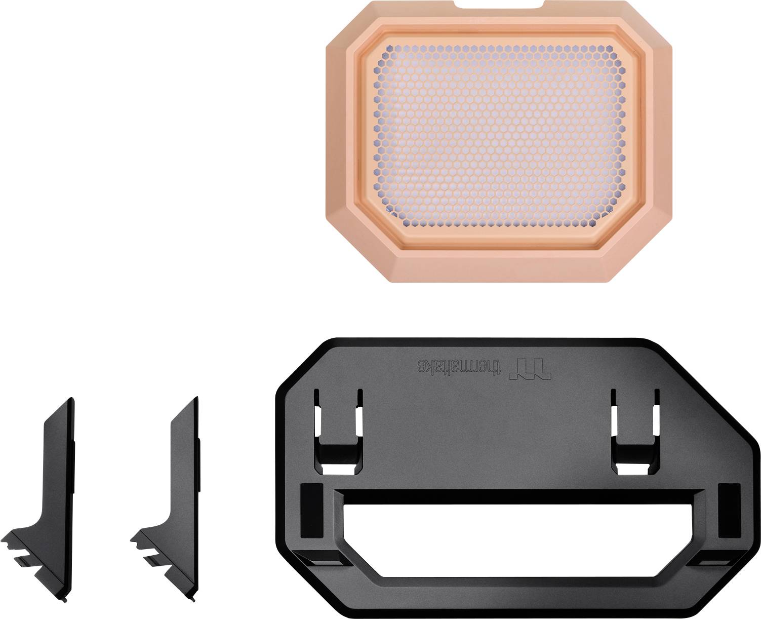 Three black plastic components and an orange perforated mat, likely parts of an accessory set for electronic devices.