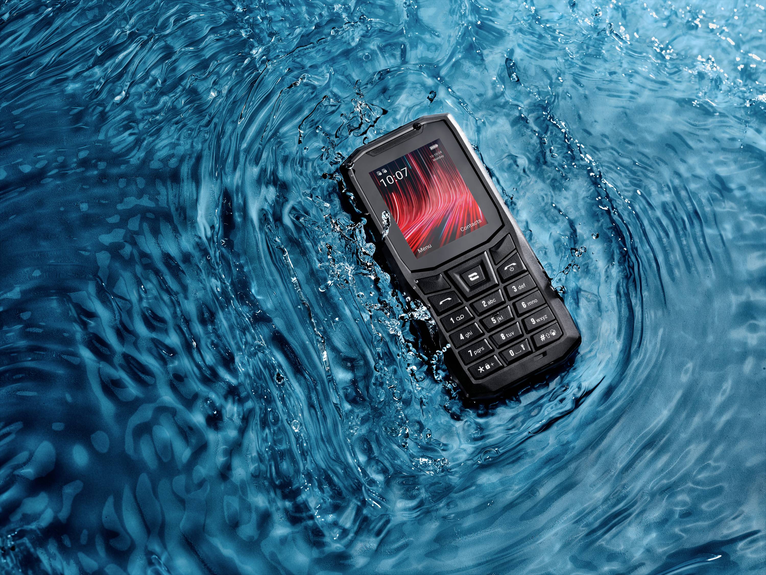 A resilient mobile phone sits on the water's surface, highlighting its waterproof characteristic.