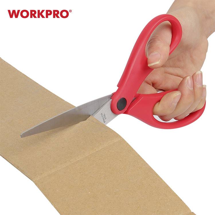 'Red scissors cut brown cardboard. Next to it, the 
