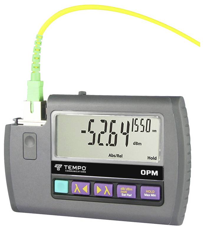 An optical power metre displays '-5.264 dBm' on its display. A yellow cable is connected to the device.