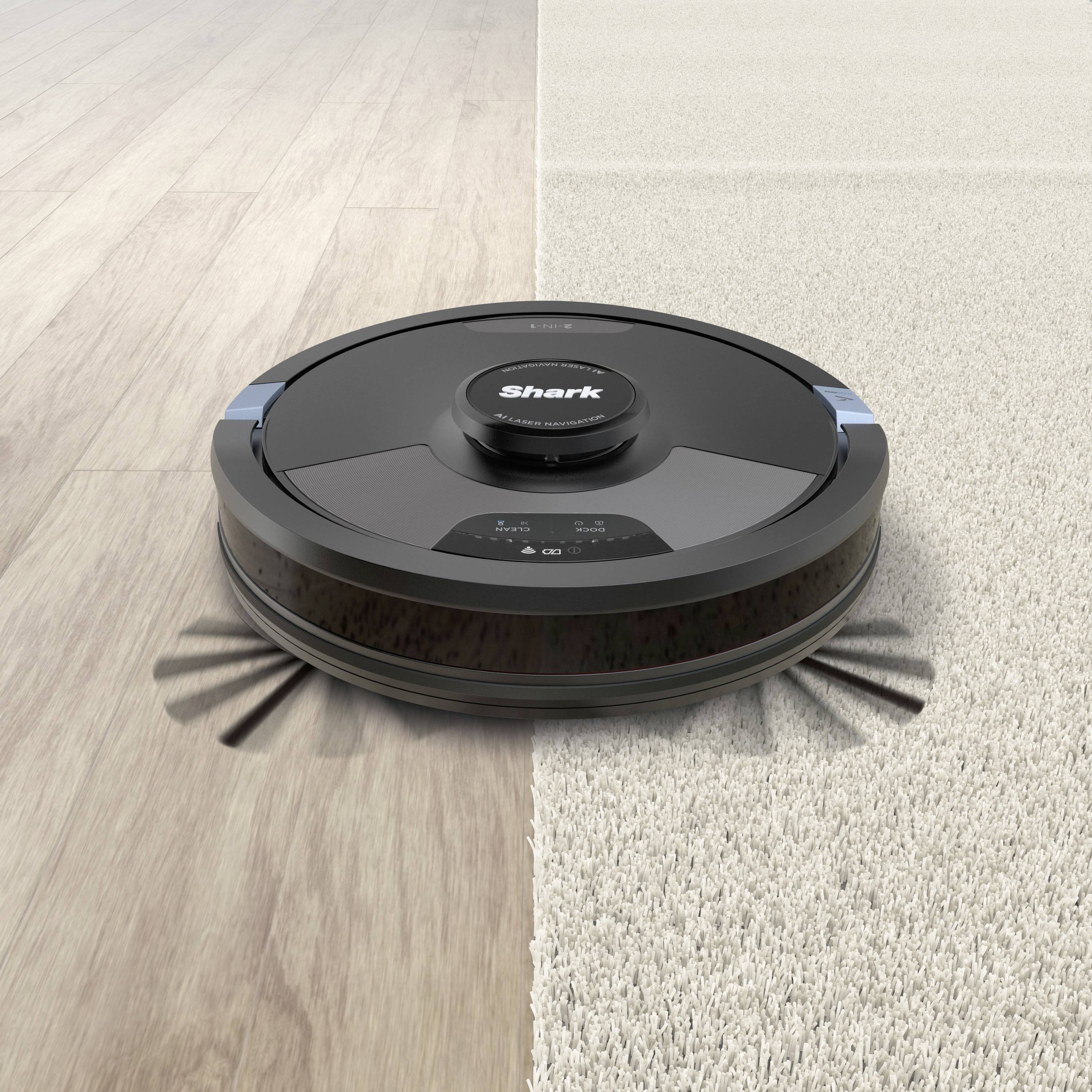 Robot vacuum on a divided surface: Left is light wooden flooring, right is beige carpet. Device cleans both surface types seamlessly.