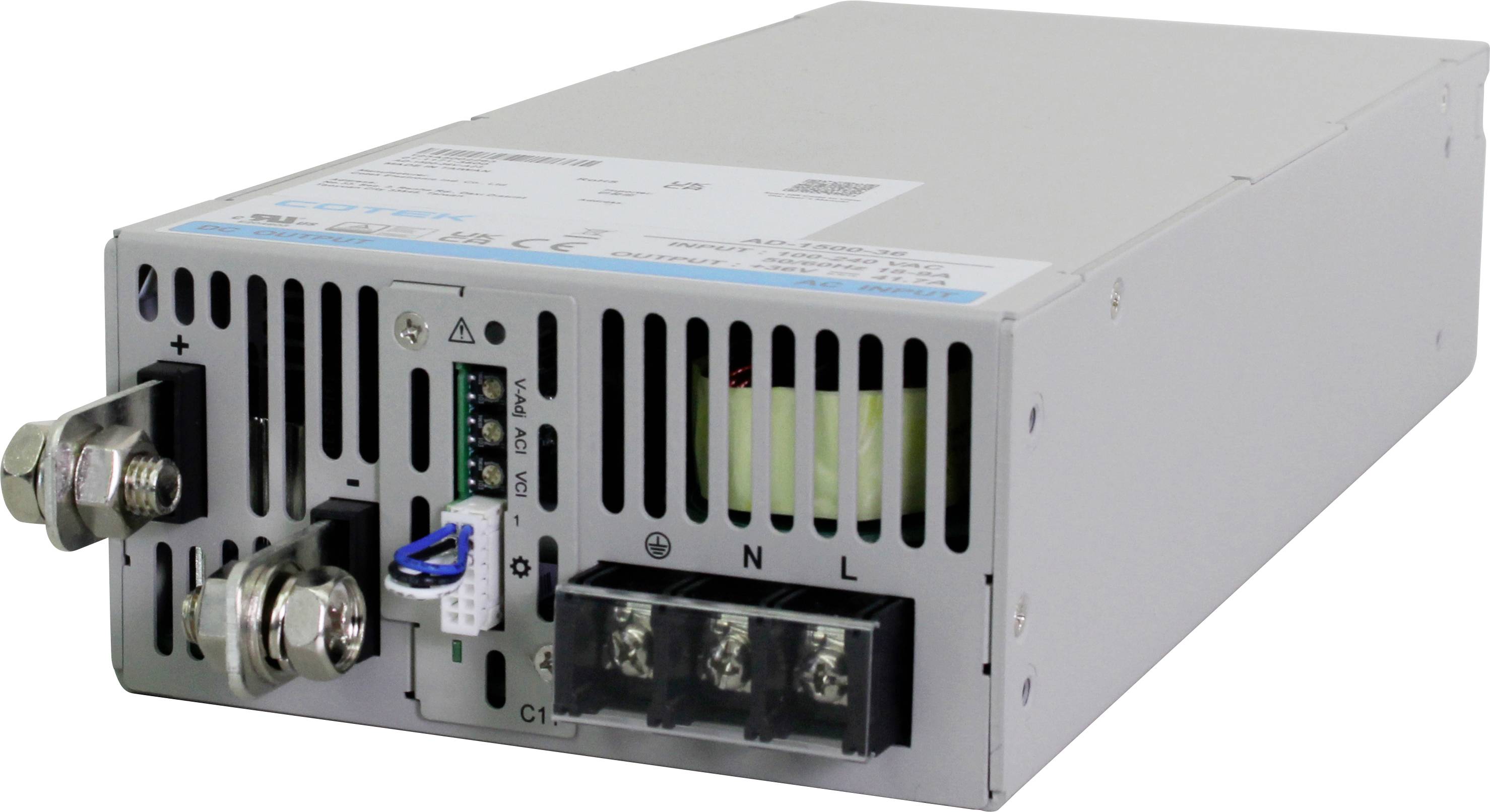 A silver, rectangular power supply enclosure with connections and ventilation slots, used in industrial electronic systems.