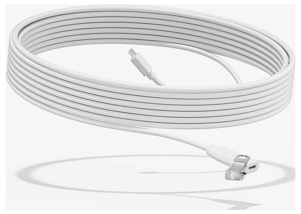A long, white charging cable with a Lightning connector and clip; coiled in a spiral, resting on a light surface.