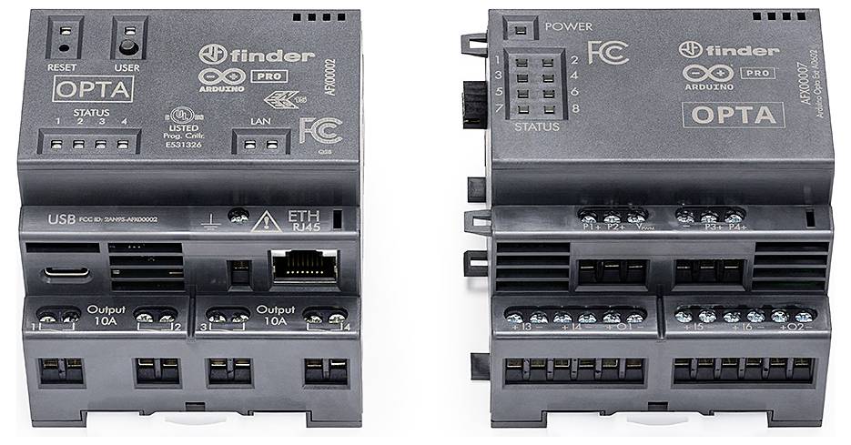 Two black, modular electronic devices with connections and status indicators, suitable for industrial or technical applications.