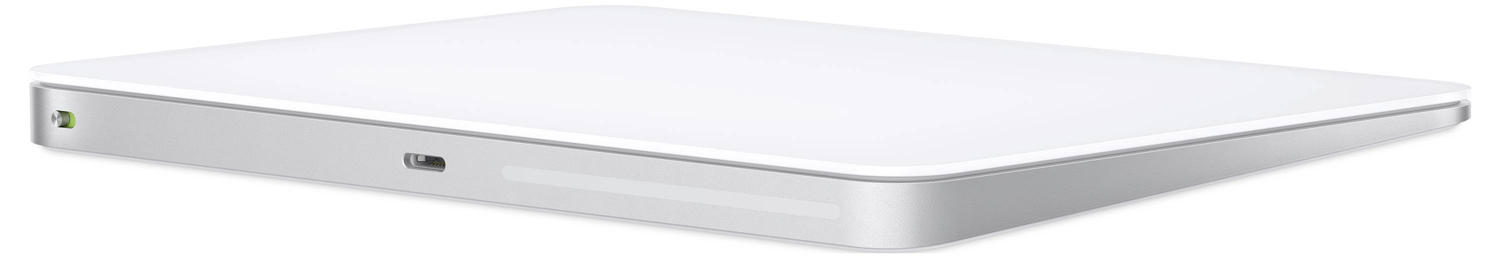 Flat, rectangular, silver external hard drive with rounded edges and USB connection, placed on a white surface.