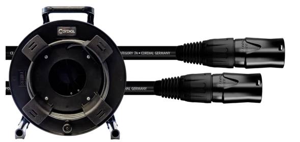 A black cable drum housing with two connected cables and connectors from Cordial Germany.