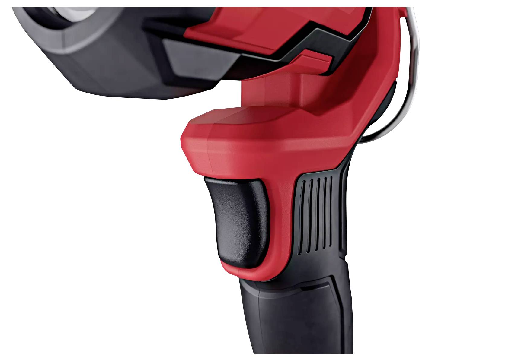 Close-up of a red drill machine button with a black handle. Main focus on the trigger mechanism.