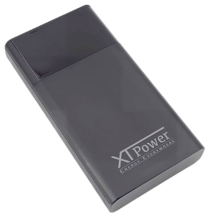 Black power bank with the inscription 'XTPower Energy Everywhere'. Rectangular shape, compact, suitable for mobile charging.