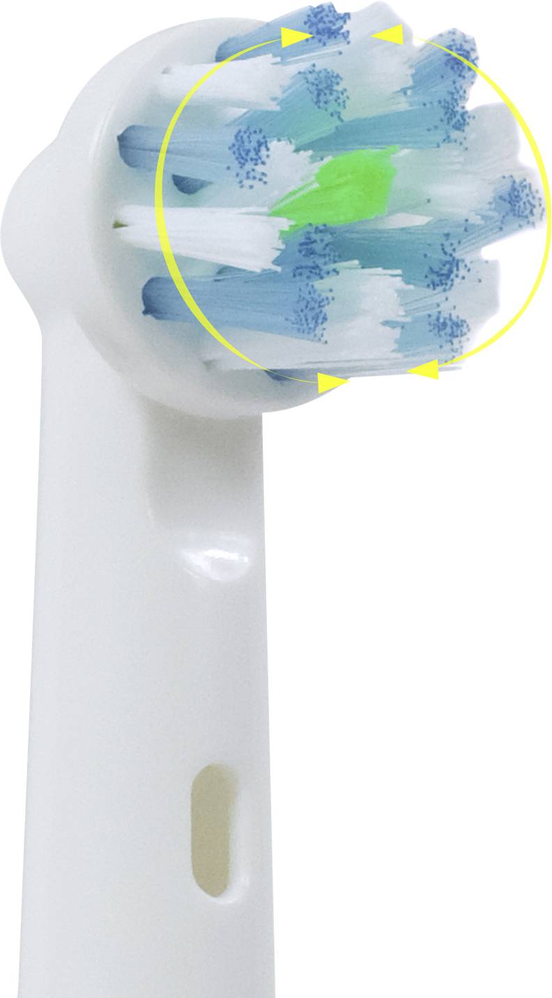 Brush head of an electric toothbrush with bristles of varying lengths arranged in a circular pattern.