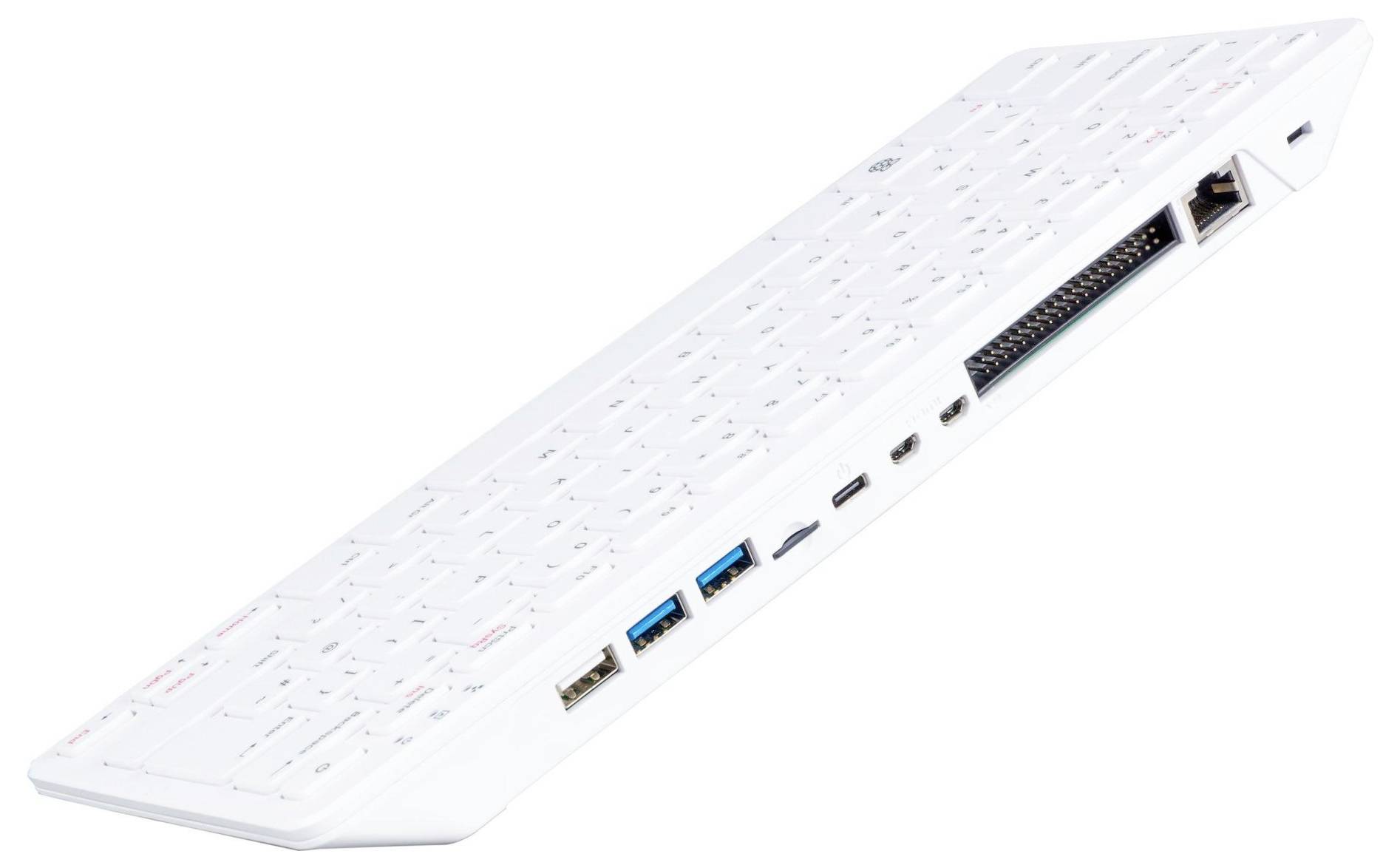 White computer keyboard with integrated ports on the side, including USB, HDMI and Ethernet, viewed from the side.