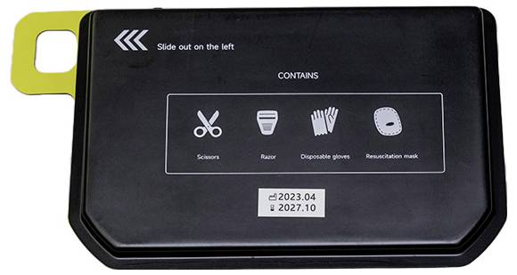Black case with pictograms and the inscription 'Scissors, Razor, Disposable gloves, Resuscitation mask'. Expiry date 10.2027.