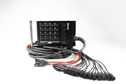 A black audio cable system with multiple connectors and cables for sound transmission, suitable for event or stage technology.